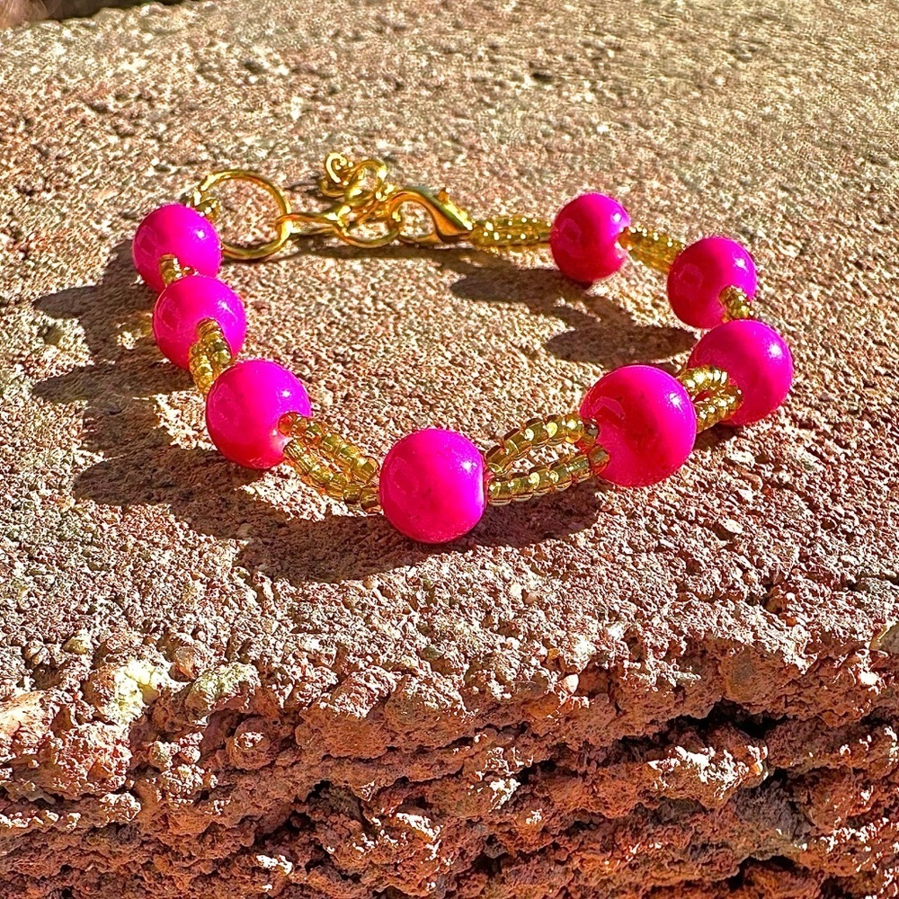 Hot Pink and Gold Glass Beaded Adjustable Bracelet with Gold Colored Accents